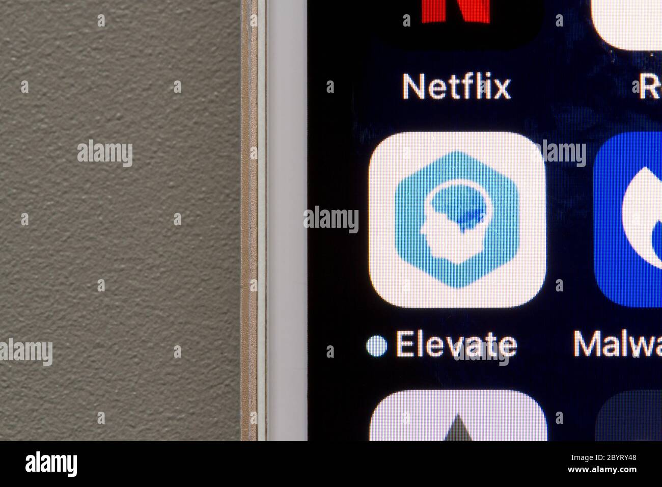 Elevate app icon is seen on an iPhone. The app uses research-based games to train up different areas of one's cognition and lets users to track progress. Stock Photo