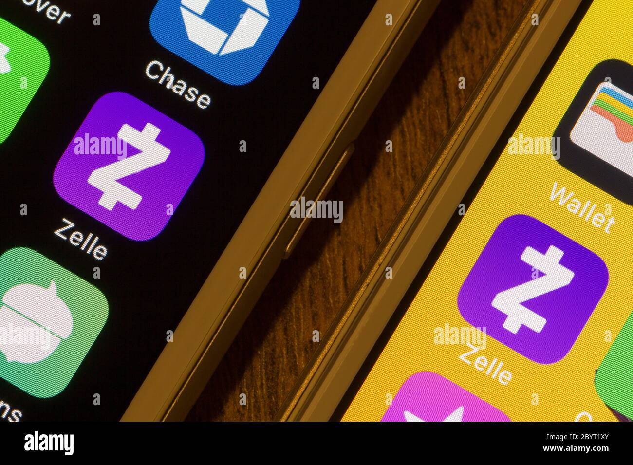 Zelle mobile app icons are seen on smartphones. Zelle is a digital payments network owned by Early Warning Services. Stock Photo