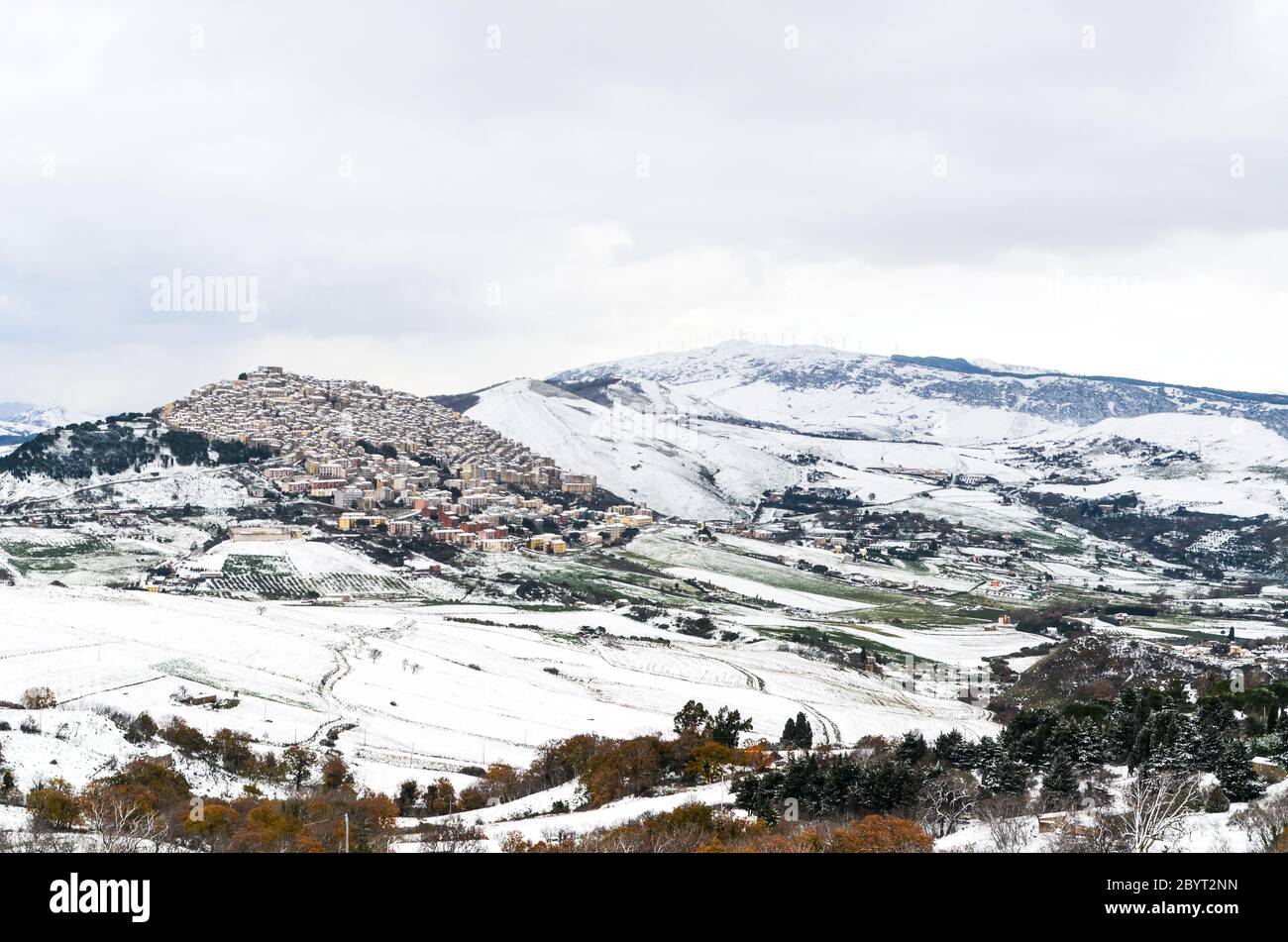 Winter landscape with snow over Gangi and Geraci Siculo in the mountains near Catania, Sicily, Italy Stock Photo