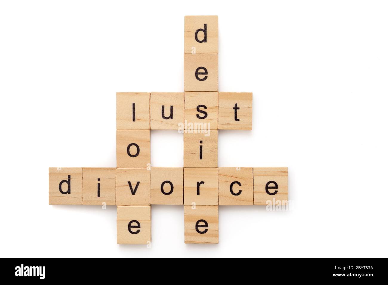 Wood letter tiles isolated on white background spelling words DESIRE, LOVE, LUST and DIVORCE Stock Photo