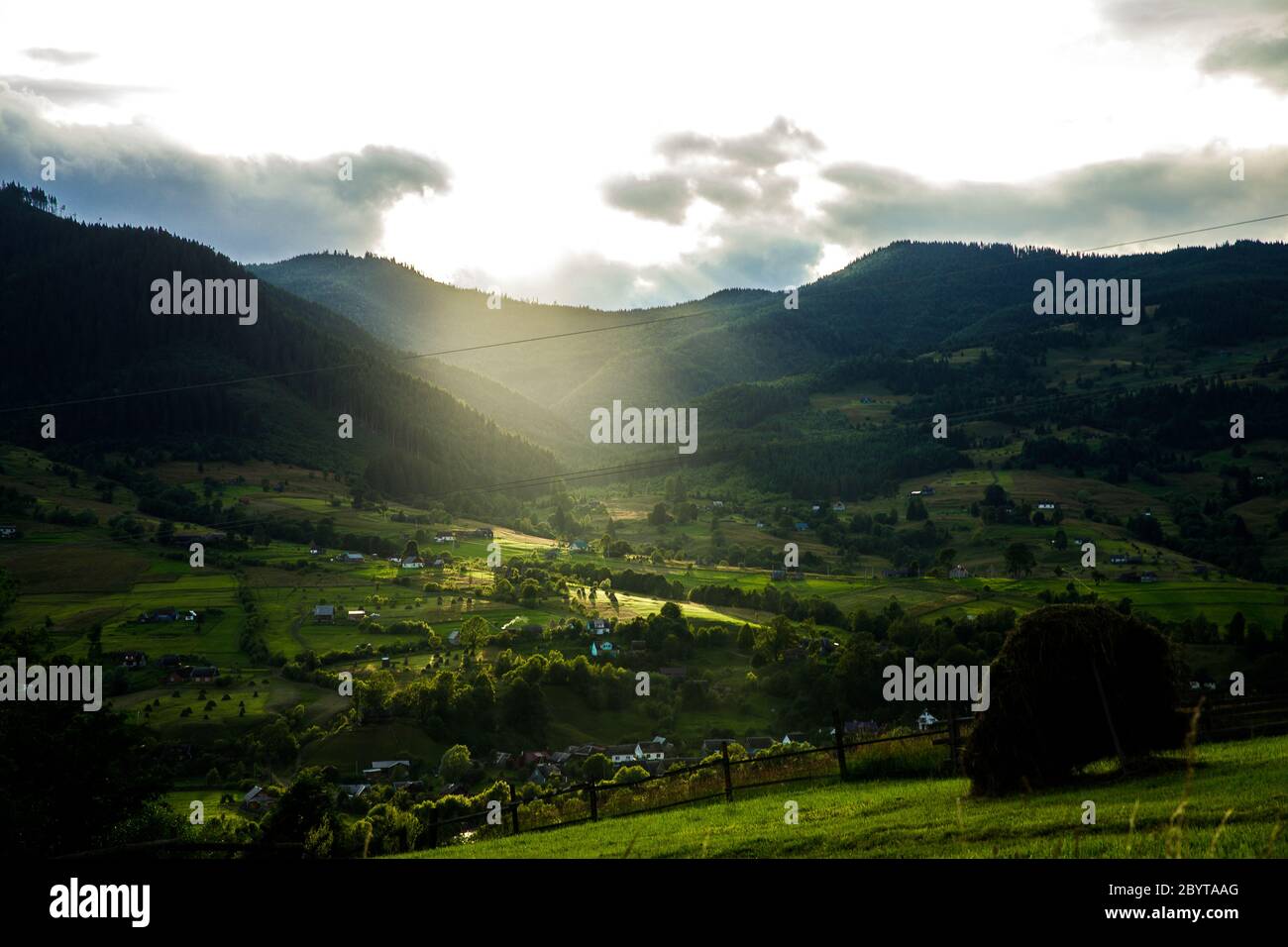 Views of the Carpathians - this is a beautiful country in the mountains of the Carpathians after sunset. Carpathians are located in Ukraine. In the Stock Photo