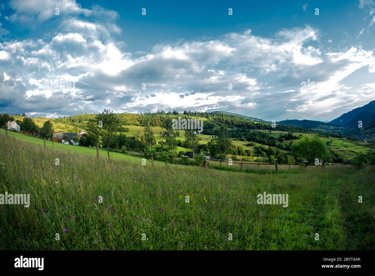 Views of the Carpathians - this is a beautiful country in the mountains of the Carpathians after sunset. Carpathians are located in Ukraine. In the Stock Photo