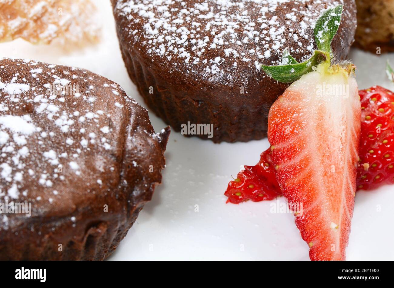 Chocolate cake with a strawberry Stock Photo - Alamy