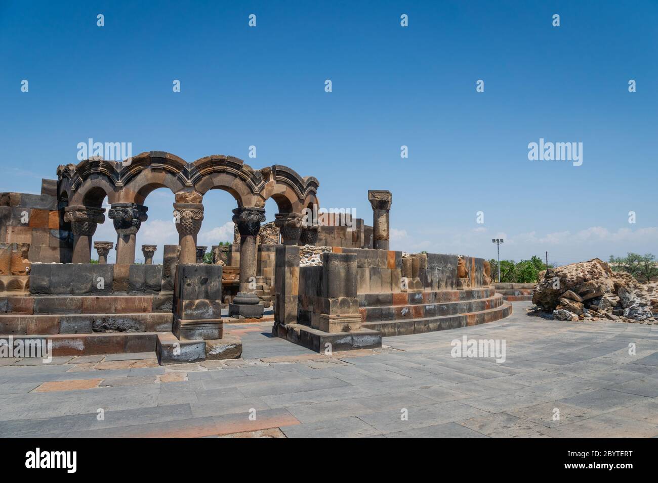 Zvartnots Cathedral ruin near Yerevan, Armenia. Zvartnots Cathedral is a 7th-century centrally planned aisled tetraconch type Armenian cathedral Stock Photo