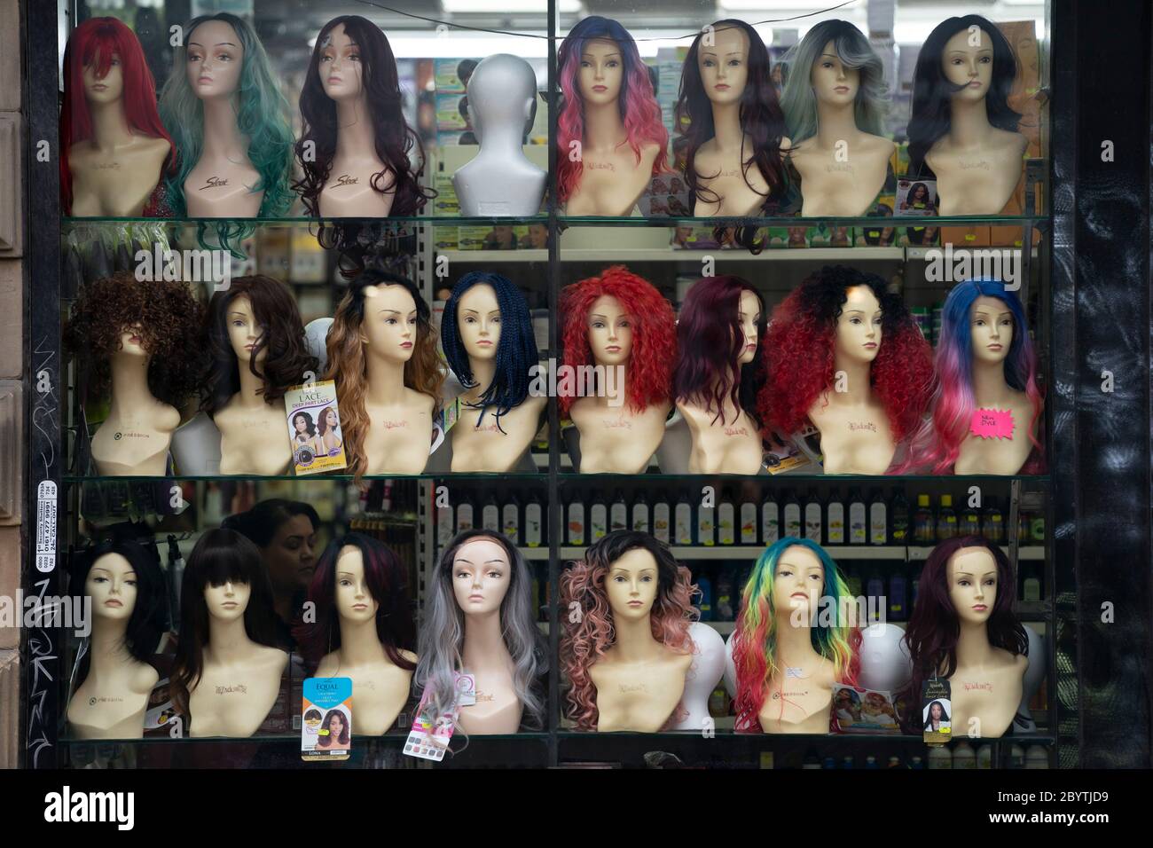 Manchester, UK. 10th June, 2020. Wigs are seen for sale in a shop window in the Northern Quarter, Manchester, UK. Credit: Jon Super/Alamy Stock Photo