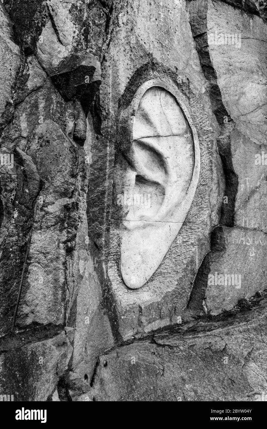 LIPNICE NAD SAZAVOU, CZECH REPUBLIC - DECEMBER 31, 2018: Bretschneider's Ear scuplture in old granite rock quarry near Lipnice Castle. Black and white image. Stock Photo
