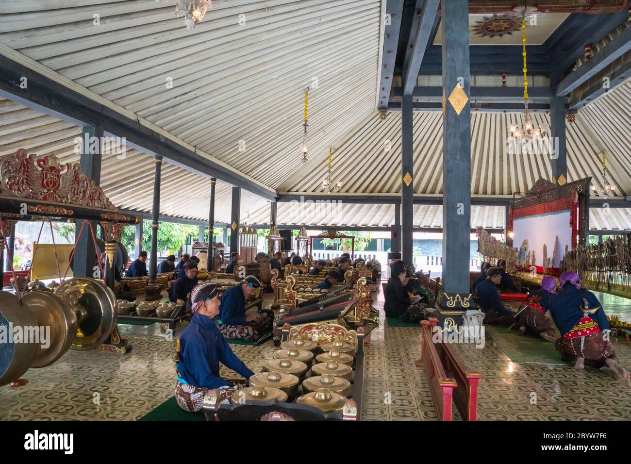 Yogyakarta, Indonesia - October 2017: Musicians perform Gamelan music and Wayang, shadow puppet show,  at King's palace. Stock Photo