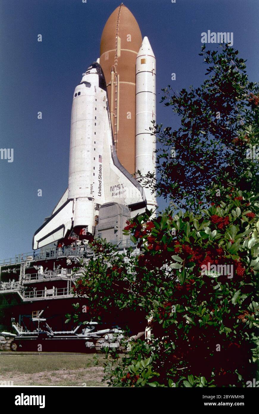 S97-00249 (10 Dec. 1996) --- Having departed the giant Vehicle Assembly Building (VAB), the space shuttle Atlantis slowly moves out to Launch Pad 39B along the Crawlerway. Atlantis is scheduled to liftoff Jan. 12 on STS-81, the first dhuttle mission of 1997. The planned nine-day flight will include the fifth Shuttle-Mir docking. Stock Photo