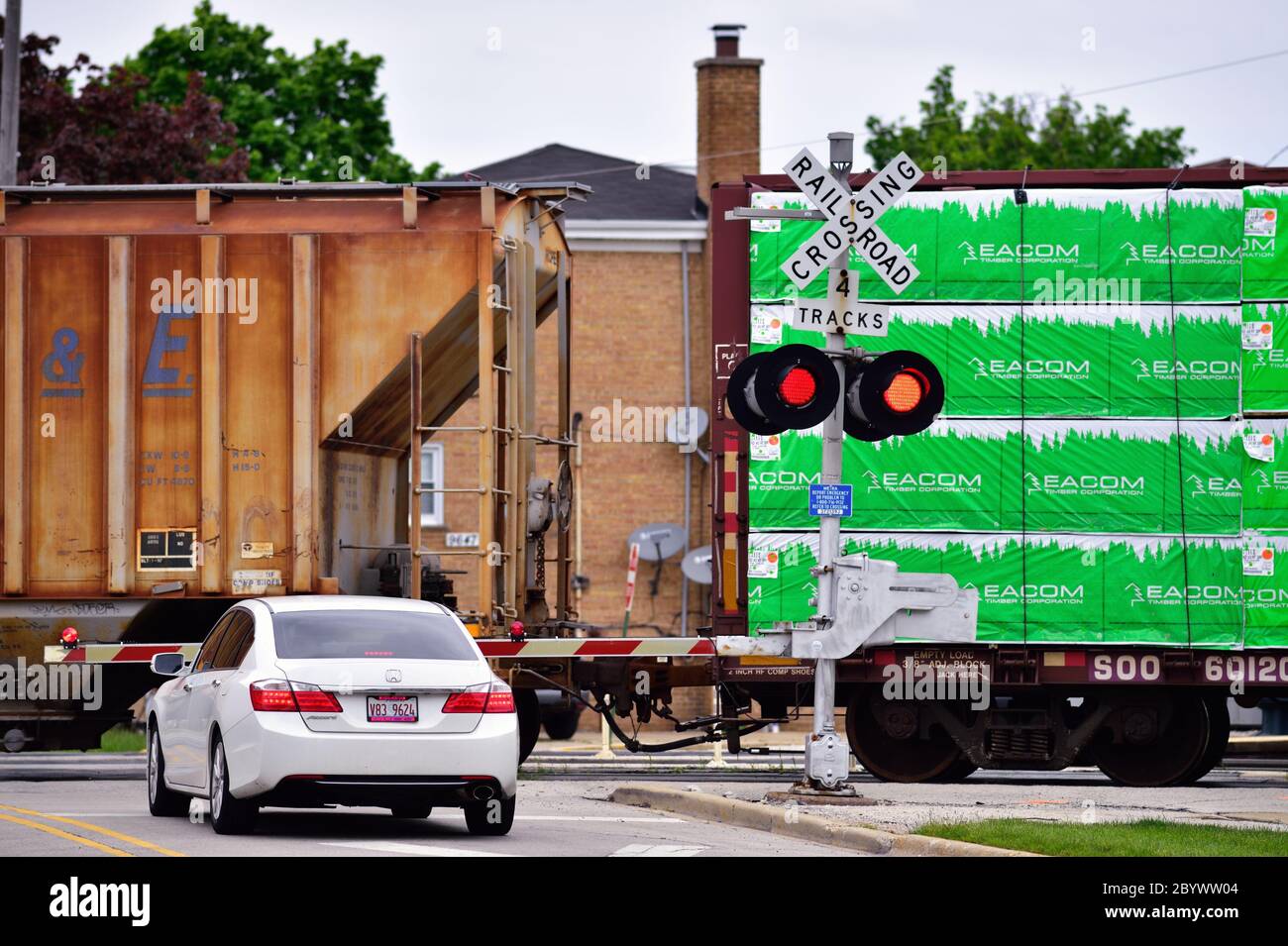 Franklin Park, Illinois, USA. Car waits at a street crossing protected