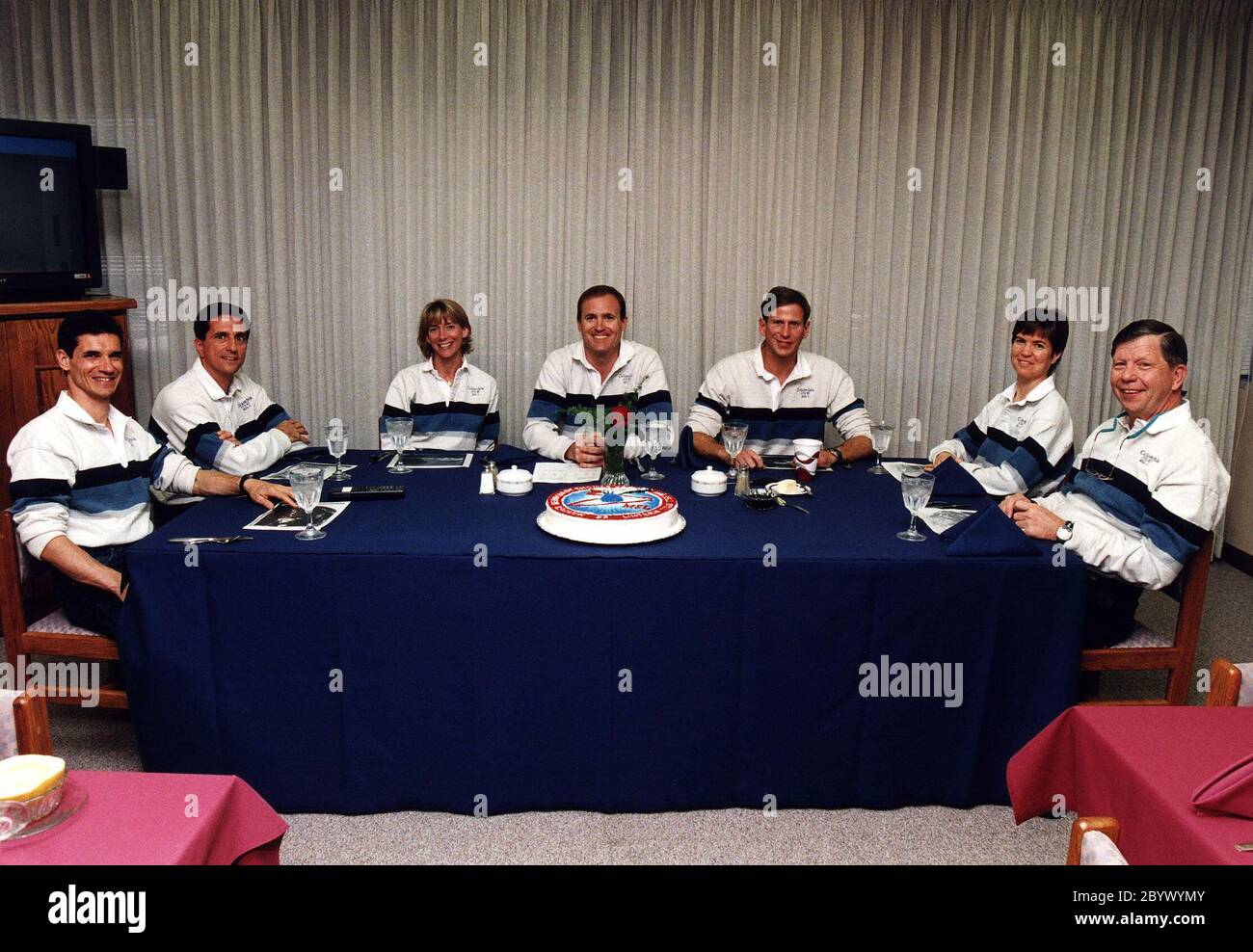 The STS-83 flight crew enjoys the traditional pre-liftoff breakfast in the crew quarters of the Operations and Checkout Building. They are (from left): Payload Specialist Gregory T. Linteris; Mission Specialist Donald A. Thomas; Pilot Susan L. Still; Mission Commander James D. Halsell, Jr.; Mission Specialist Michael L. Gernhardt; Payload Commander Janice E. Voss; and Payload Specialist Roger K. Crouch. After a weather briefing, the flight crew will be fitted with their launch/entry suits and depart for Launch Pad 39A. Once there, they will take their positions in the crew cabin of the Space S Stock Photo