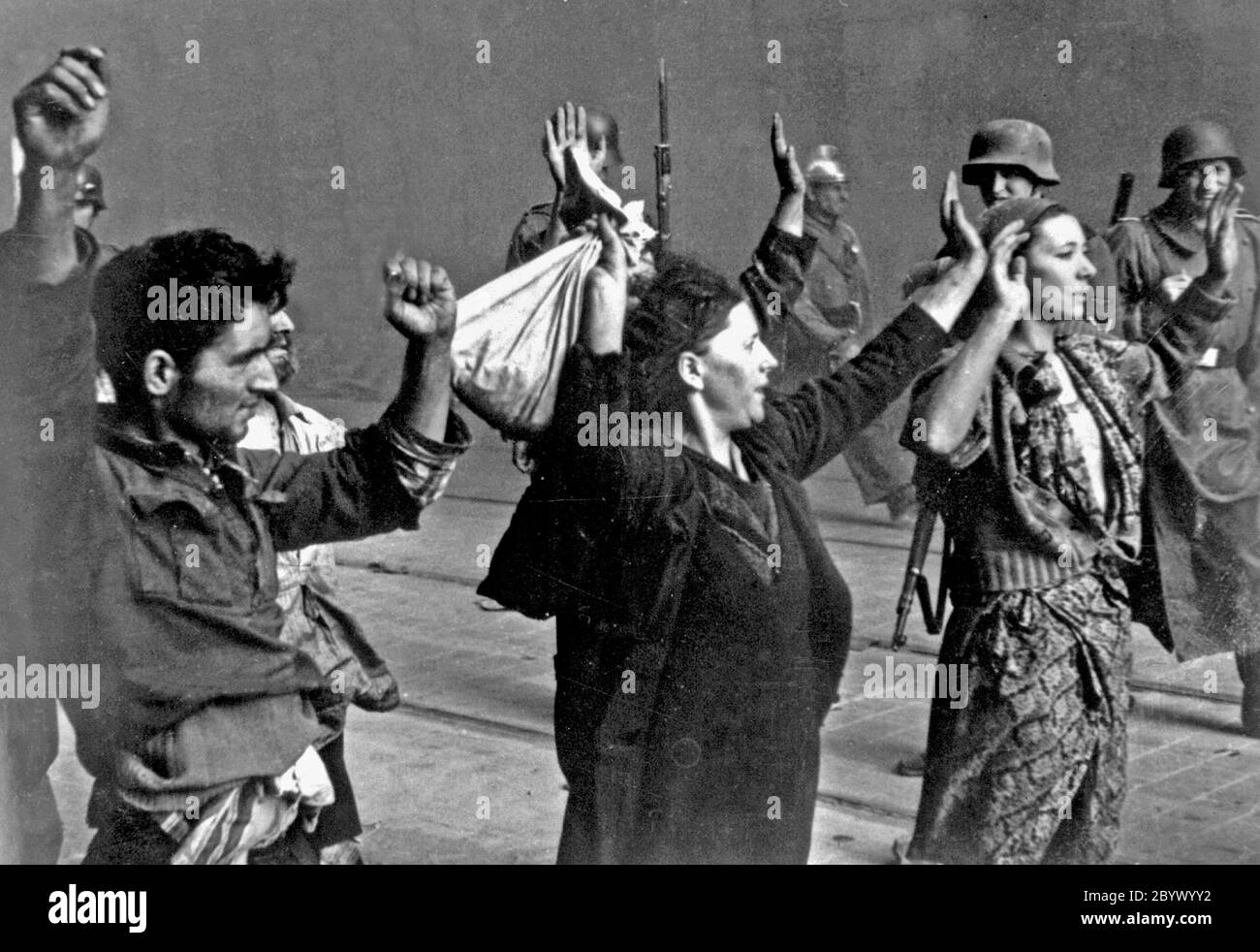 Stroop Report - Warsaw Ghetto Uprising,  Picture taken at Nowolipie street looking East, near intersection with Smocza street, Woman on the right: Hasia Szylgold-Szpiro ca. 1943 Stock Photo