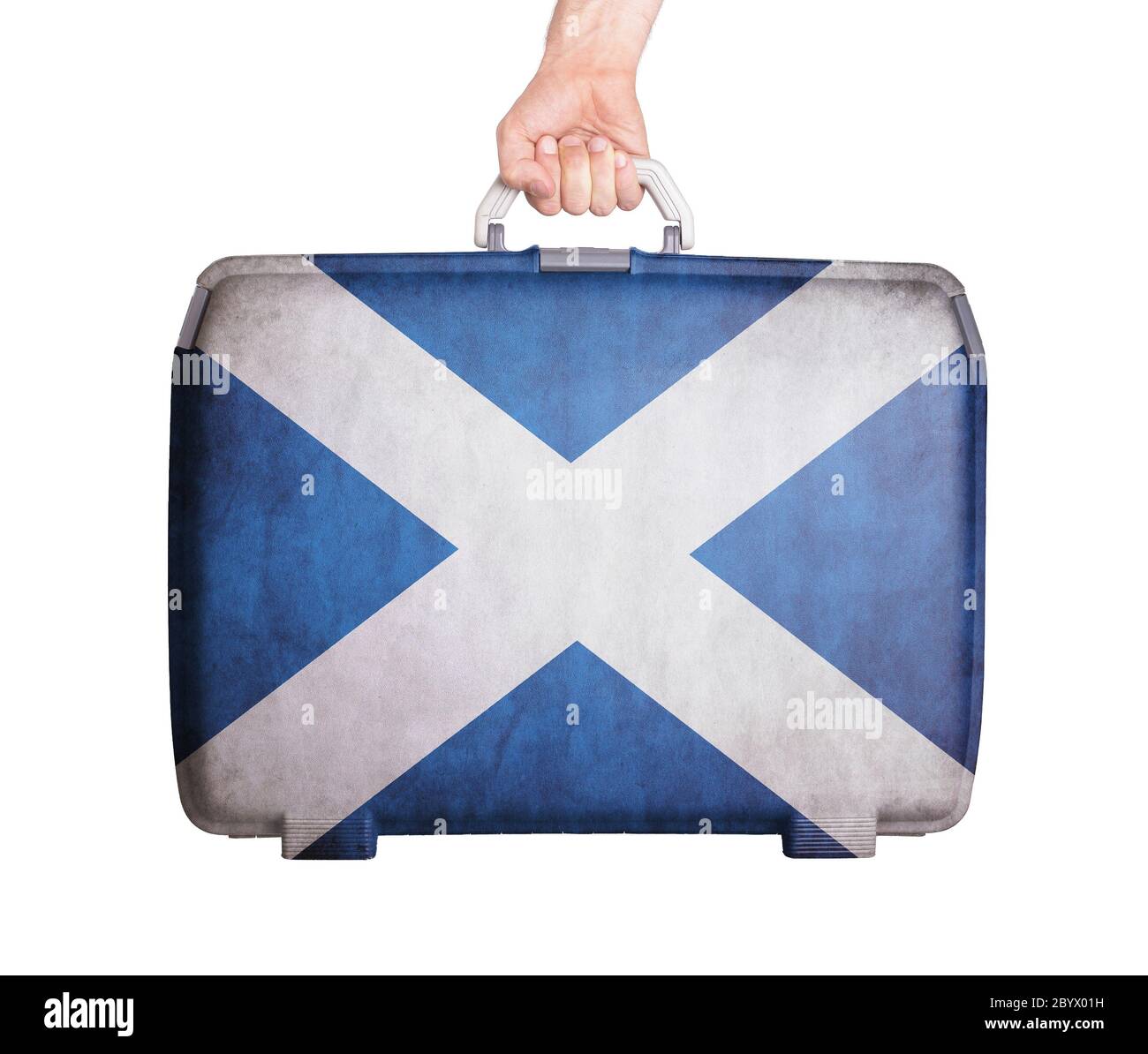 Used plastic suitcase with stains and scratches Stock Photo