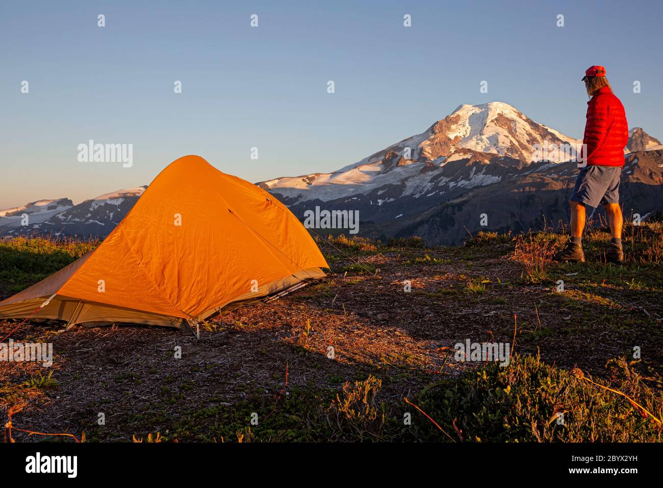 WA1665700...WASHINGTON Hiker at campsite on Skyline Divide with view
