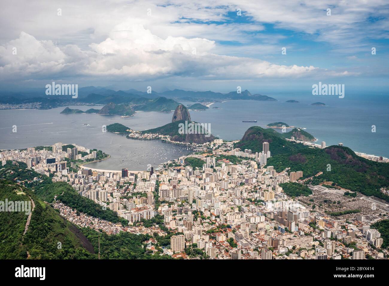 Rio de Janeiro, Brazil, aerial view of Rio cityscape and natural landmark Sugarloaf Mountain on a sunny day. Stock Photo