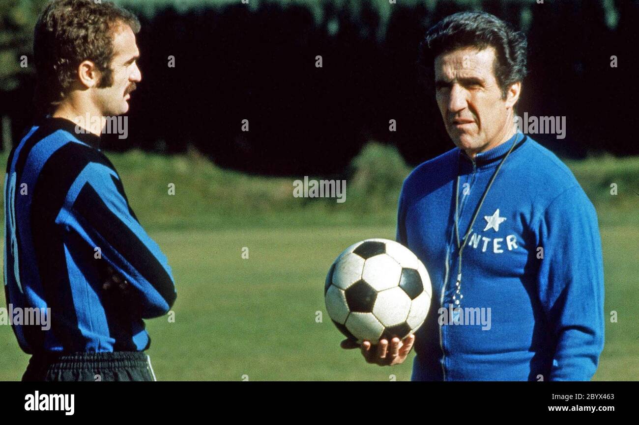 From left to right: Italian footballer Alessandro 'Sandro' Mazzola and French-Argentine football manager Helenio Herrera in training with Inter Milan in the 1973–74 season Stock Photo