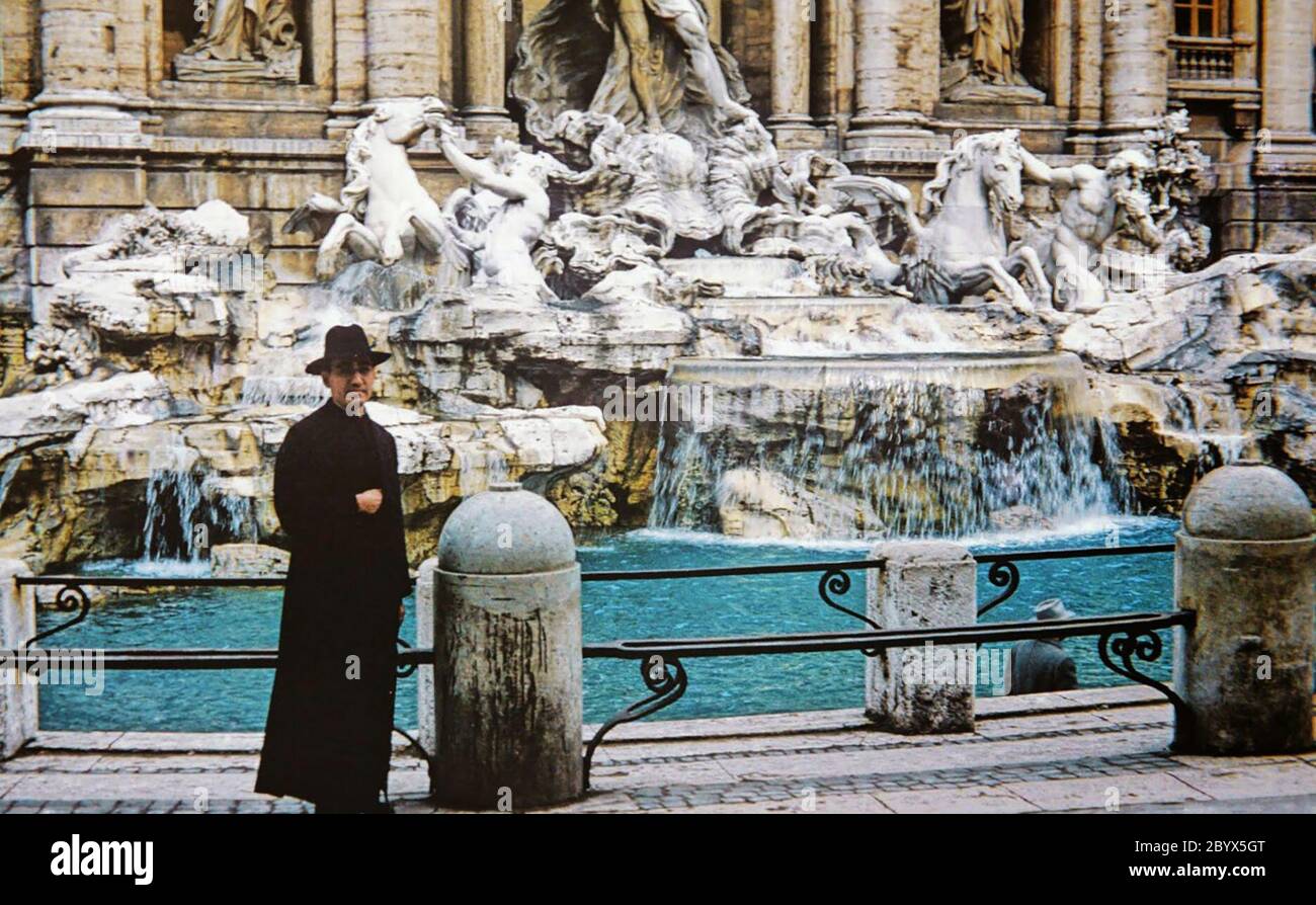 Óscar Romero in front of the Trevi Fountain in Rome ca. 1977 Stock Photo