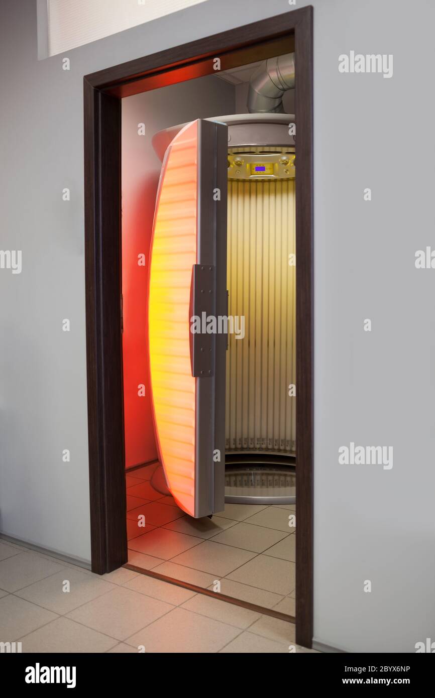 Stand up tanning bed Stock Photo