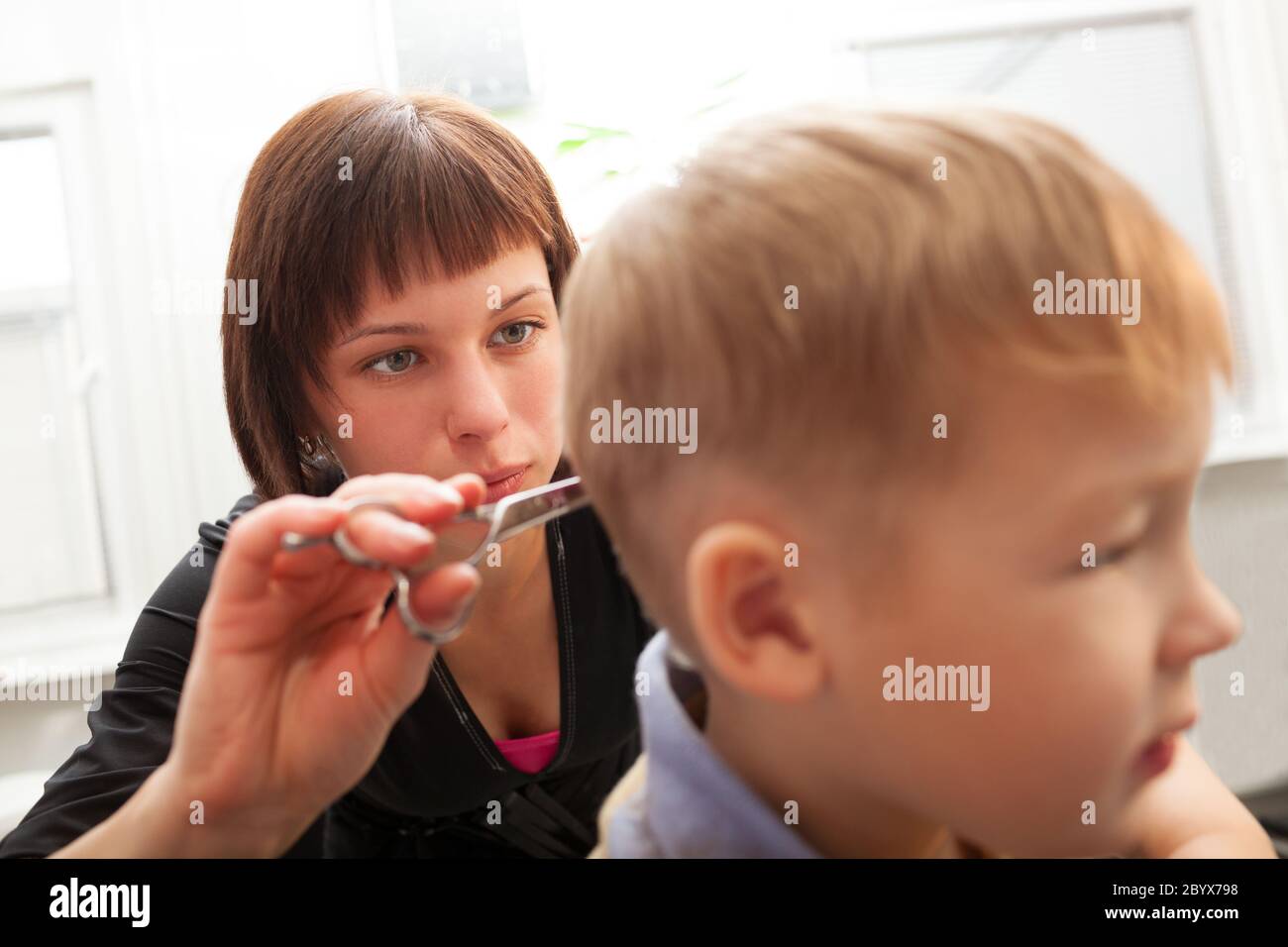 Boys cut hair hi-res stock photography and images - Alamy Boys cut hair hi-res stock photography and images - Alamy