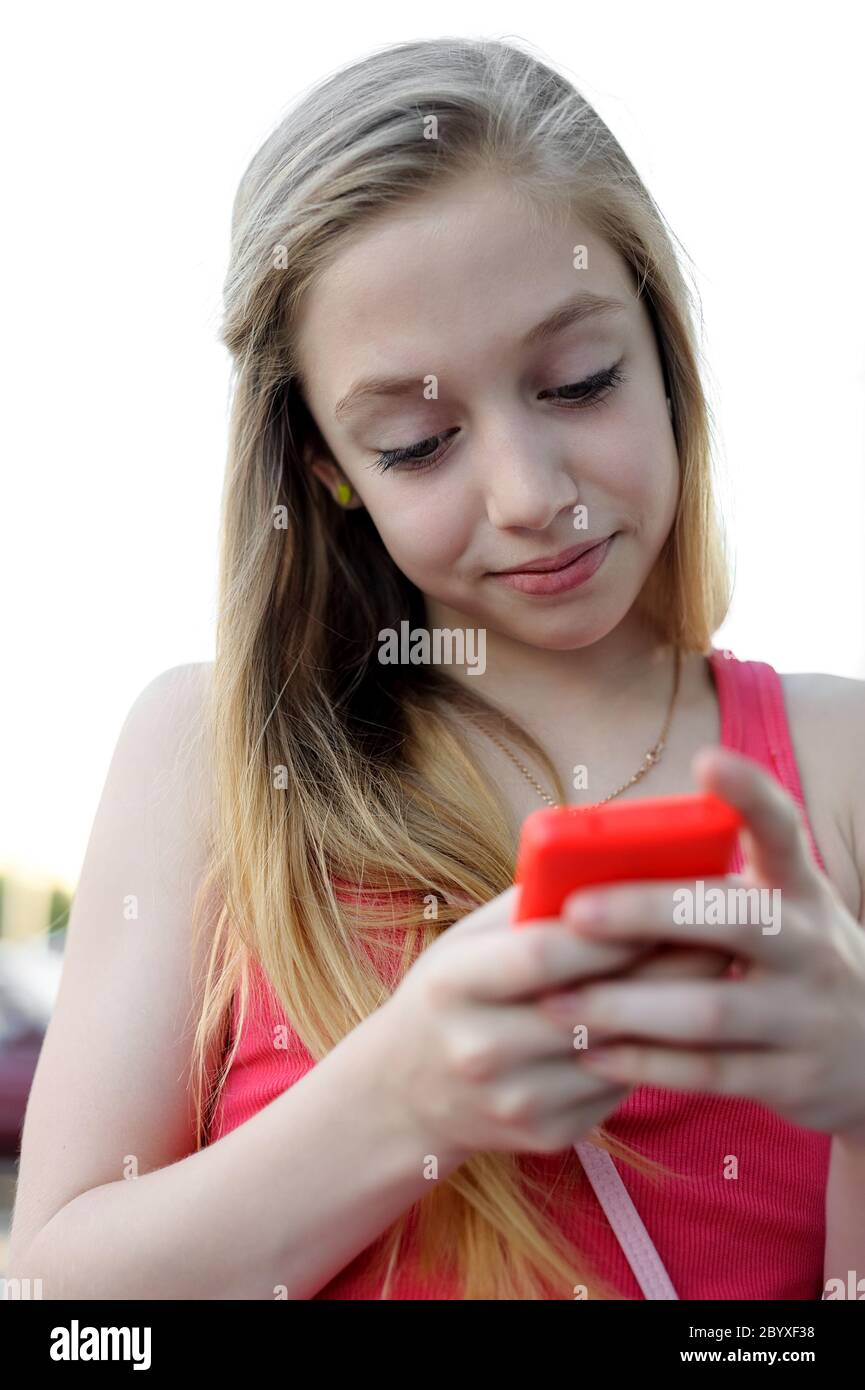 Young girl sending a message Stock Photo