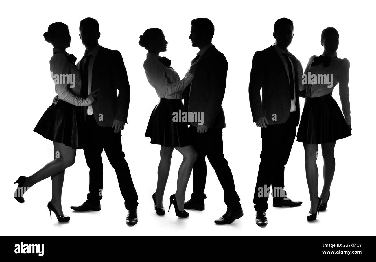 Three silhouettes of a romantic loving couple Stock Photo - Alamy
