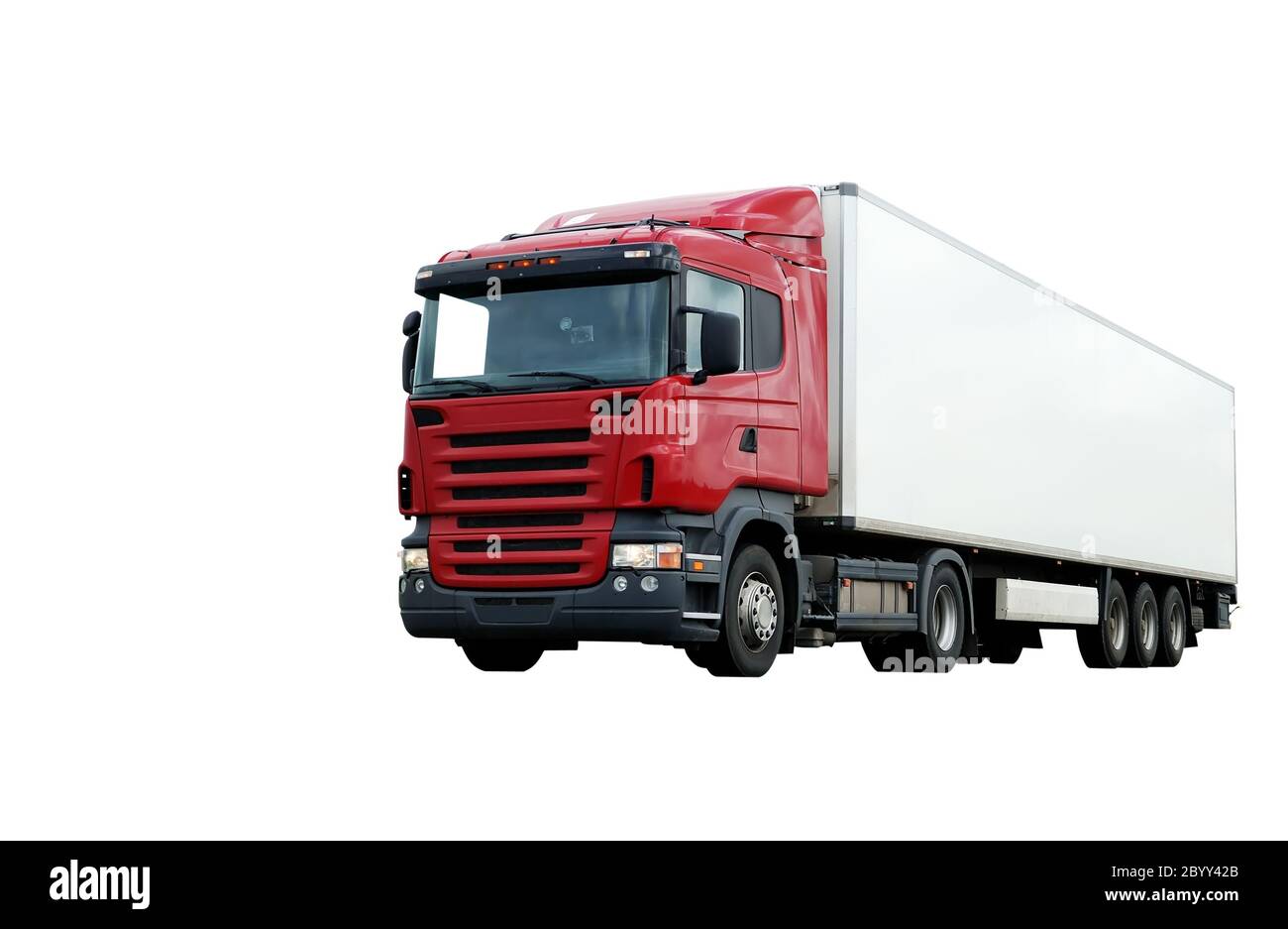 red lorry with white trailer over blue sky Stock Photo
