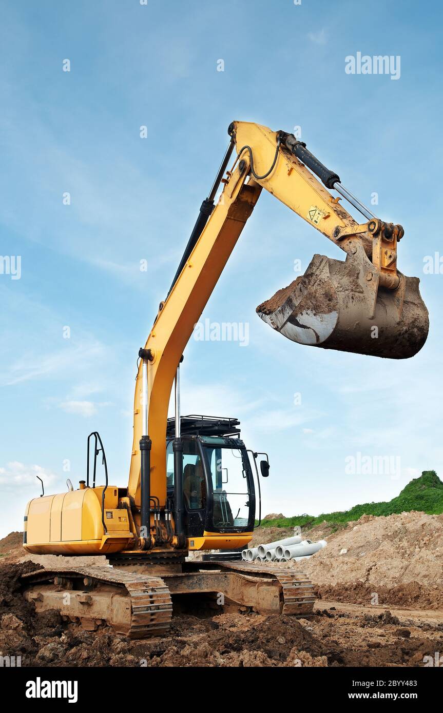 loader excavator in a quarry Stock Photo Alamy