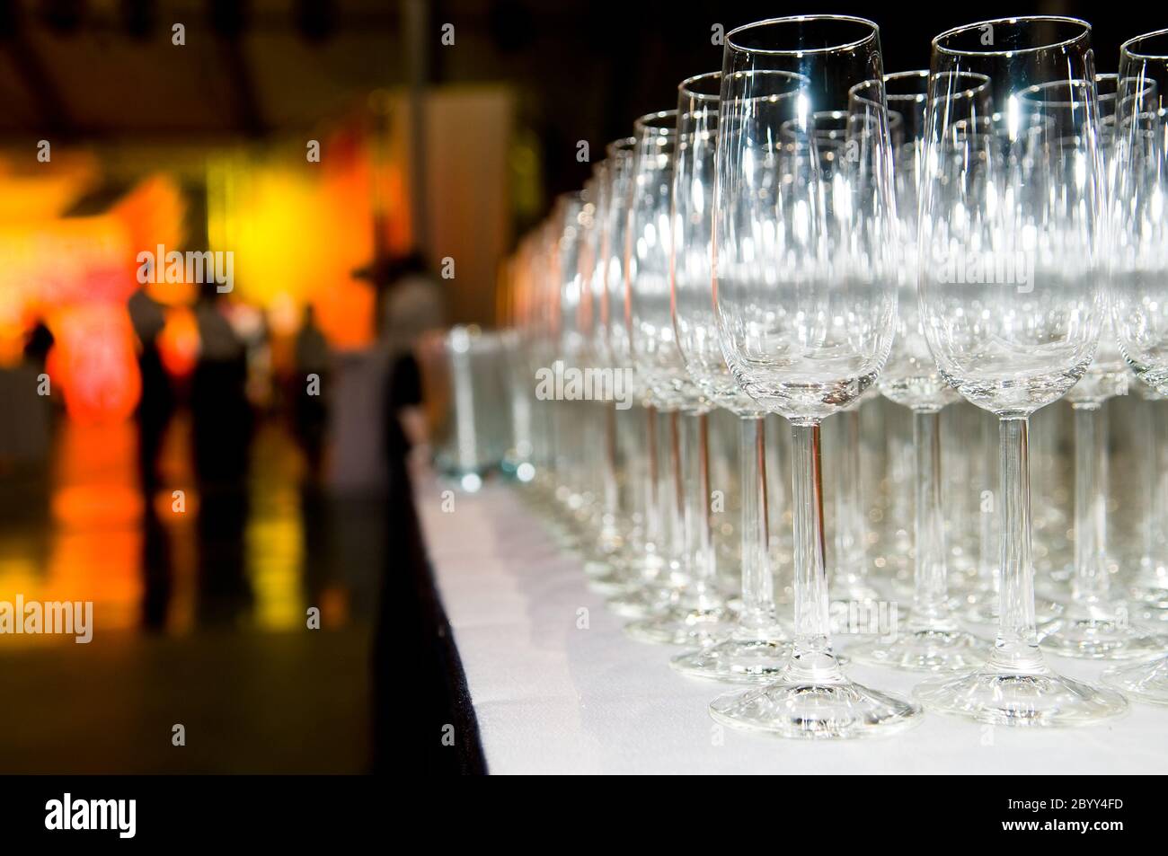 heap of stemware glass at party Stock Photo