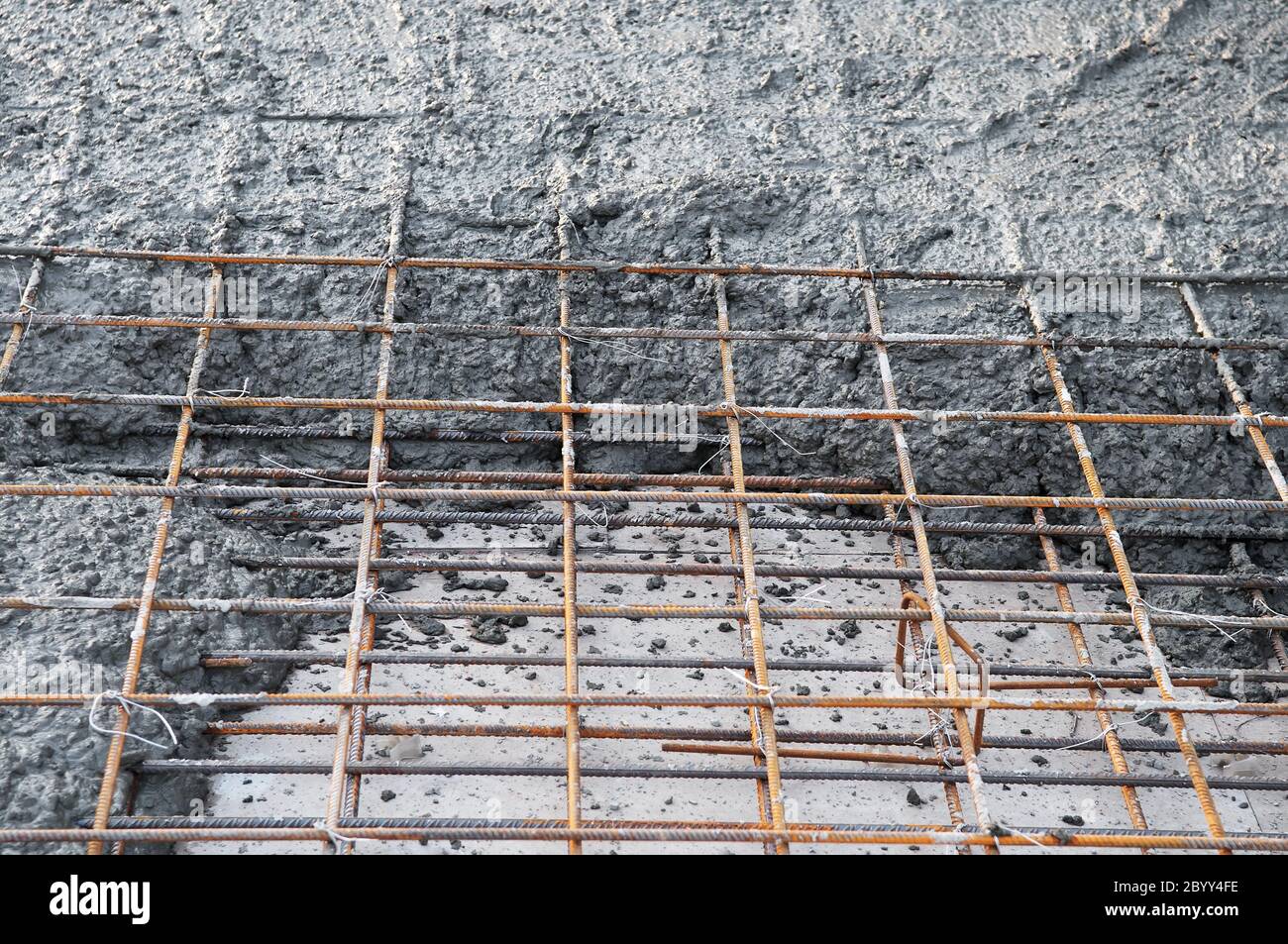 metal mesh and concrete pouring Stock Photo - Alamy