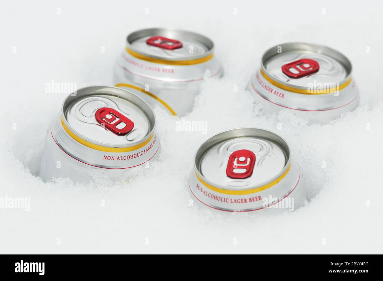 beer cans in winter snow Stock Photo