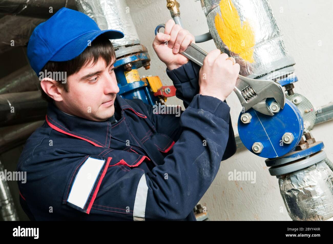 maintenance engineer in boiler room Stock Photo