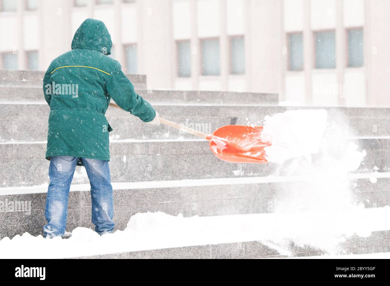 Man shoveling winter snow Stock Photo