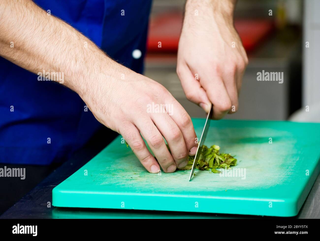 cutting greens on board Stock Photo Alamy