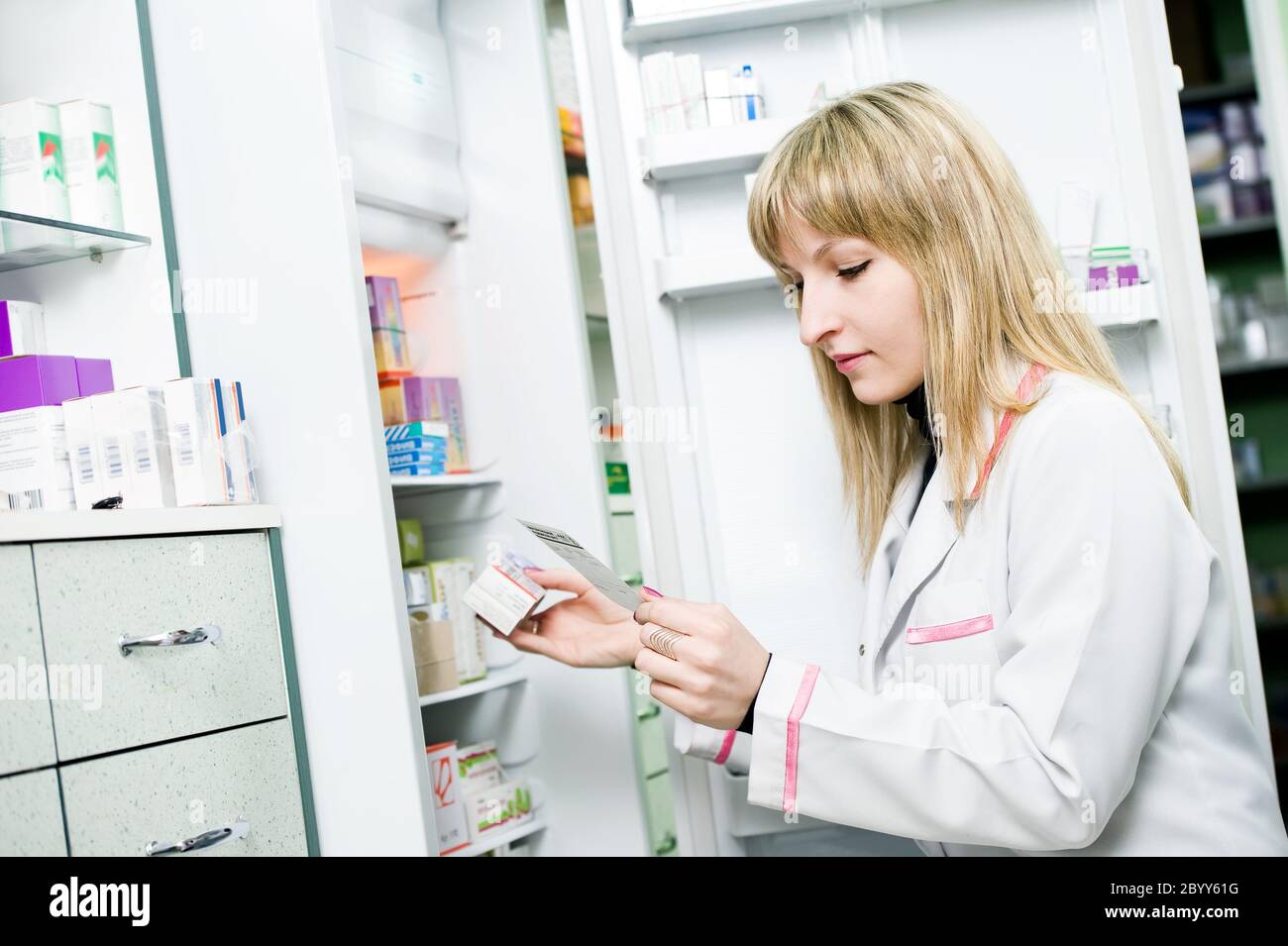 Pharmacy chemist woman in drugstore Stock Photo
