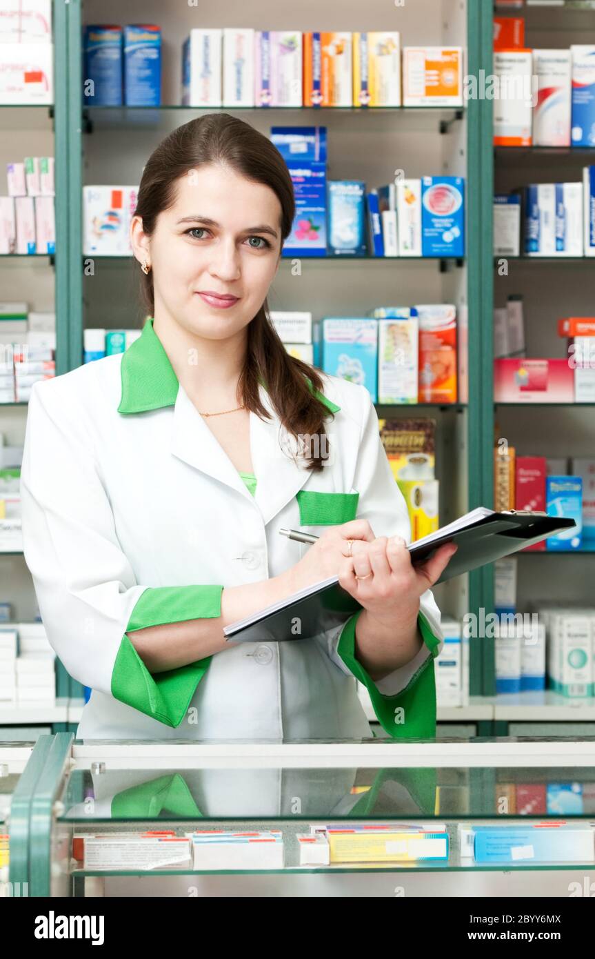 Pharmacy chemist woman in drugstore Stock Photo