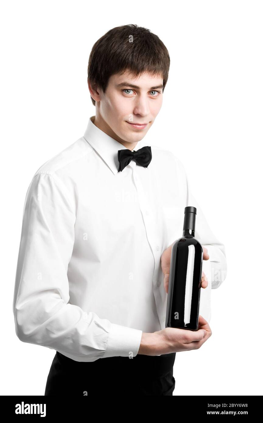 Waiter sommelier with wine bottle and stemware Stock Photo