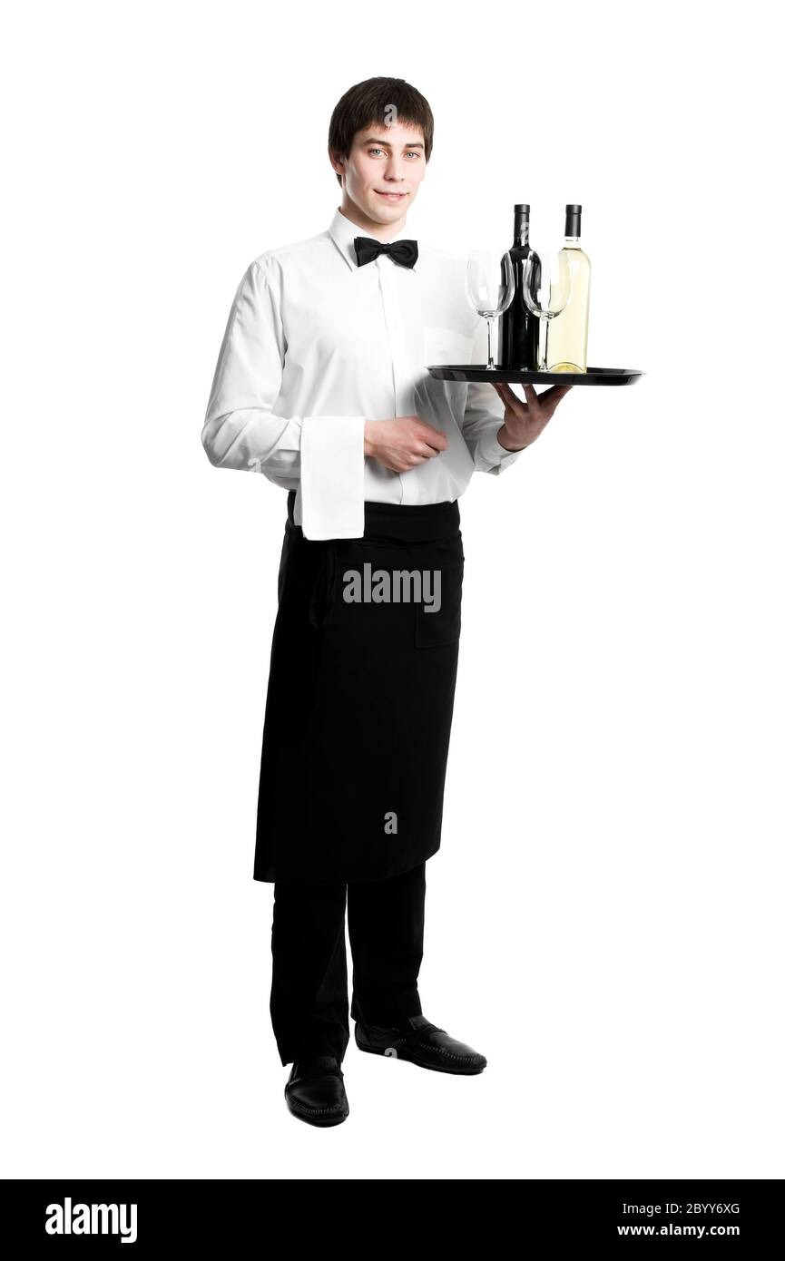 Waiter sommelier with bottles of wine and stemware on tray Stock Photo