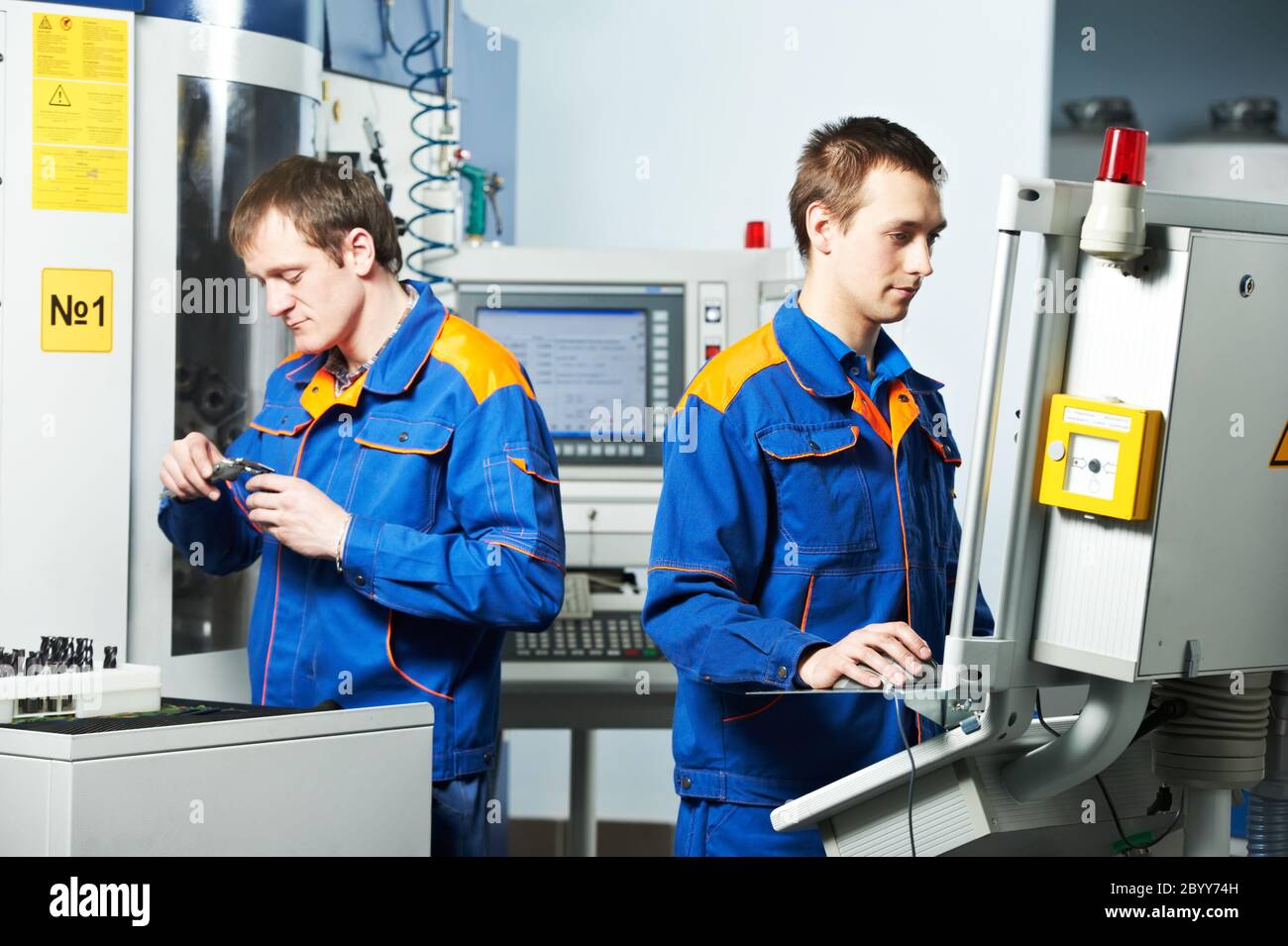 two workers at tool workshop Stock Photo
