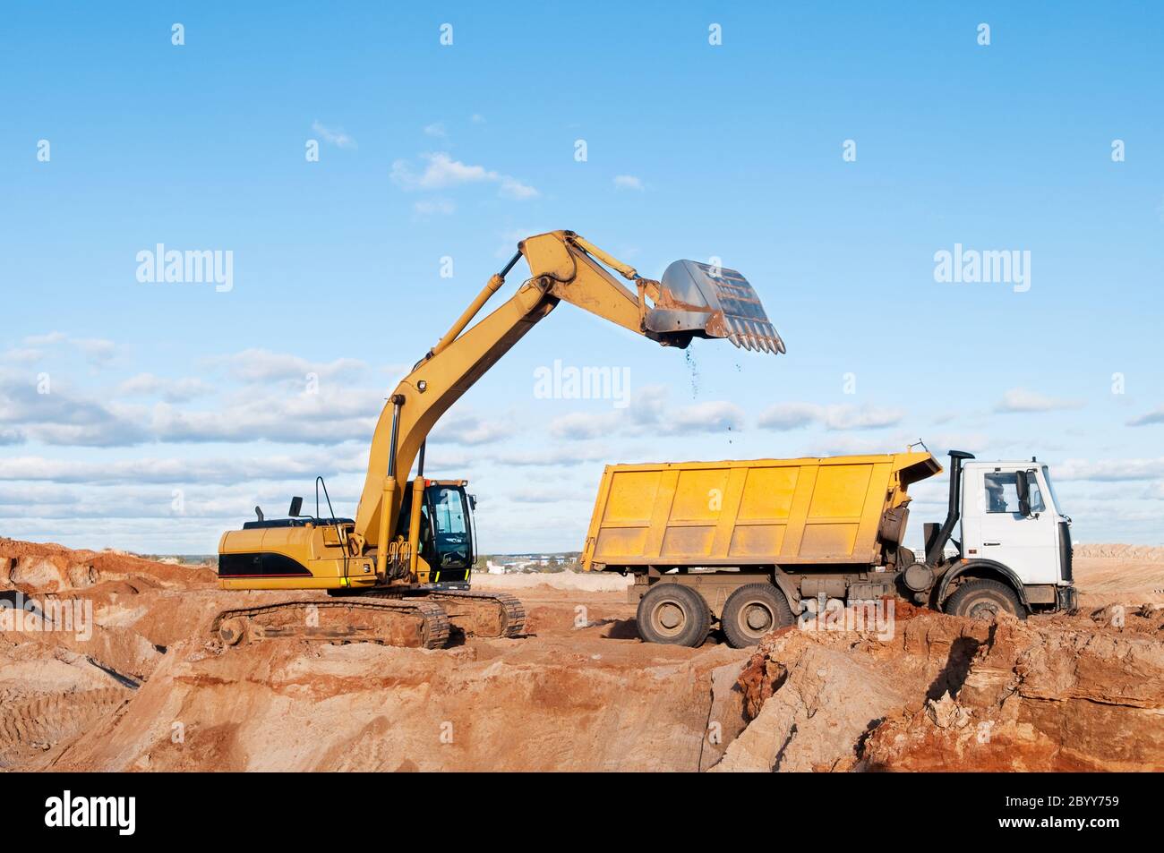 excavator and dumper truck Stock Photo