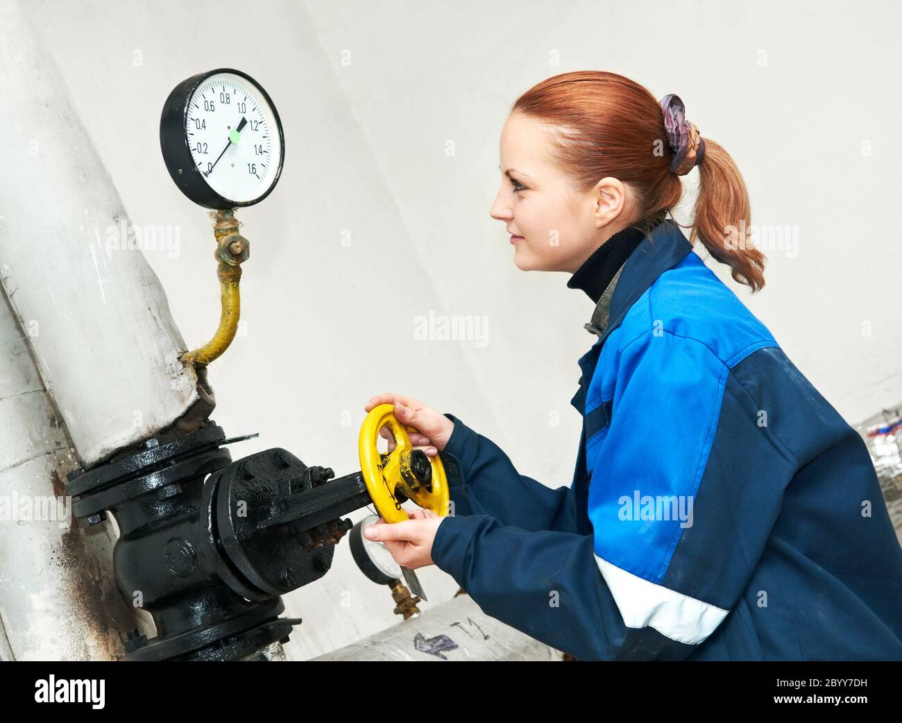 heating engineer in boiler room Stock Photo