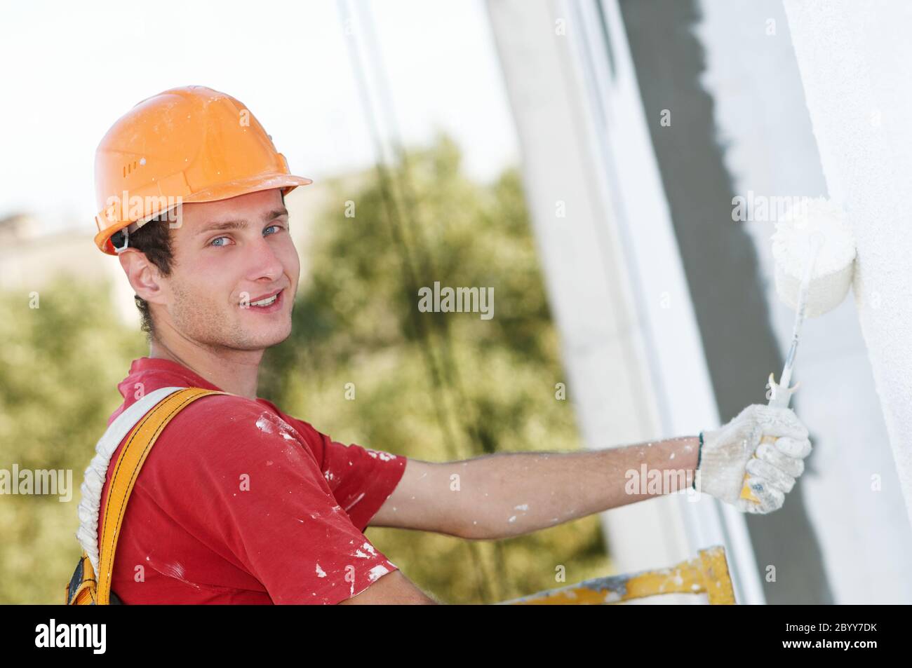 builder facade painter worker Stock Photo