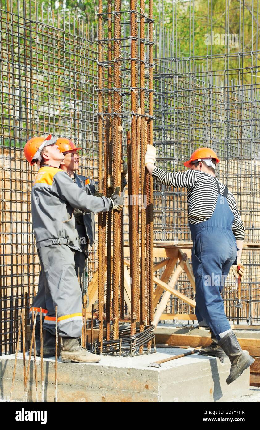 Construction site workers in action hi-res stock photography and images ...