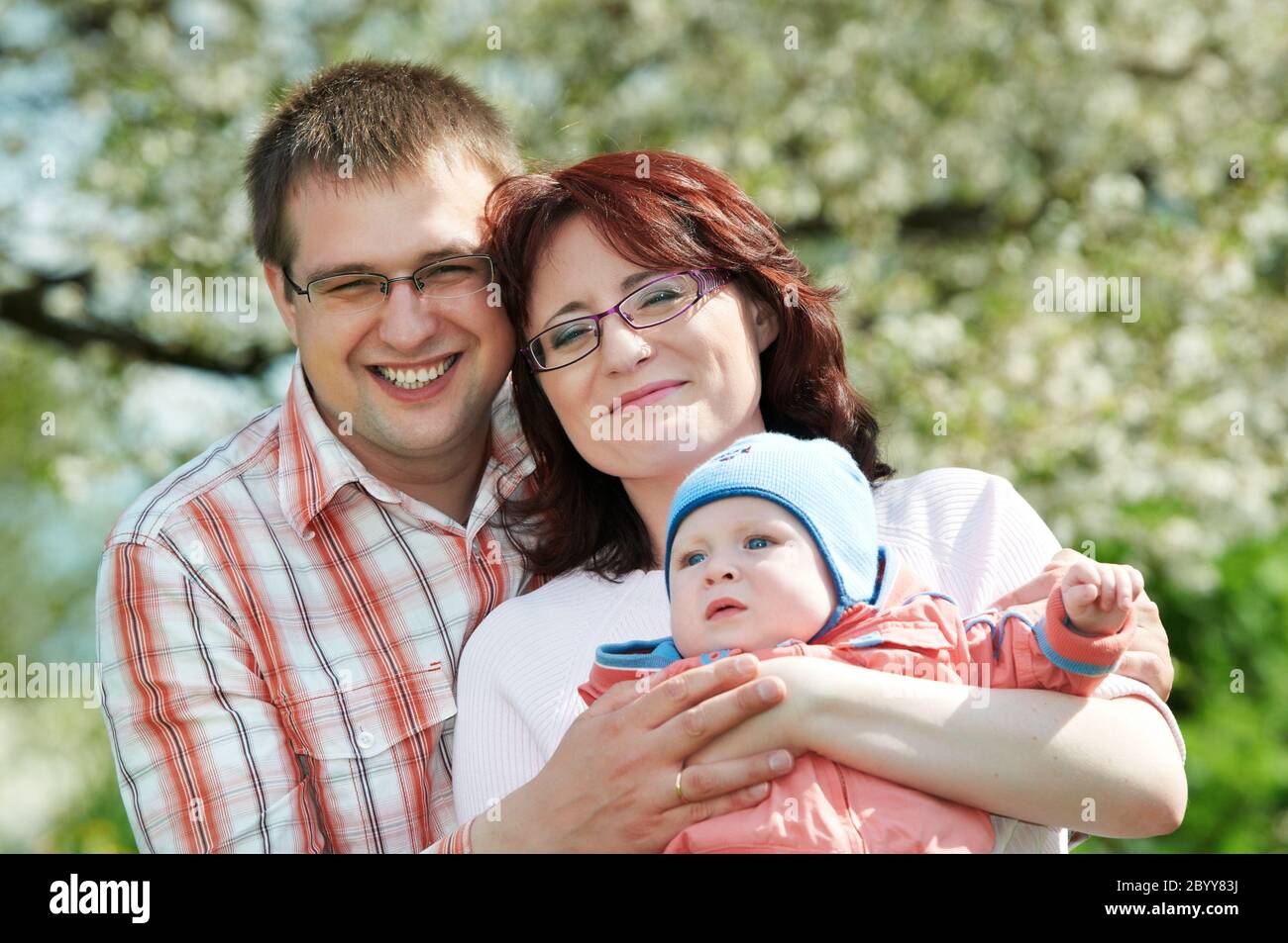 happy family at spring outdoors Stock Photo