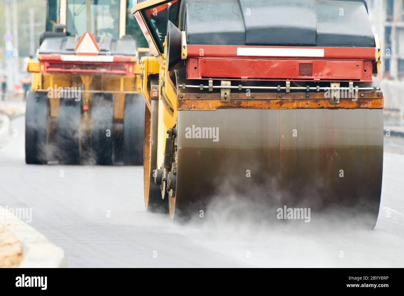 compactor roller at asphalting work Stock Photo Alamy