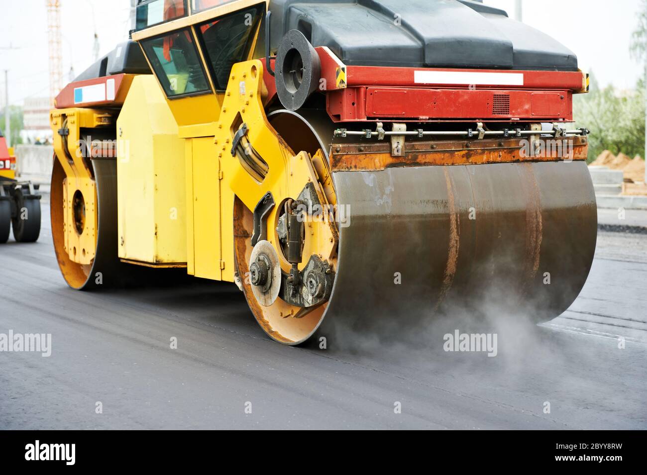 compactor roller at asphalting work Stock Photo Alamy