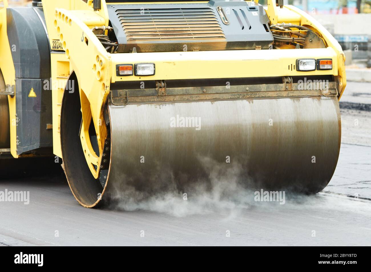 compactor roller at asphalting work Stock Photo Alamy