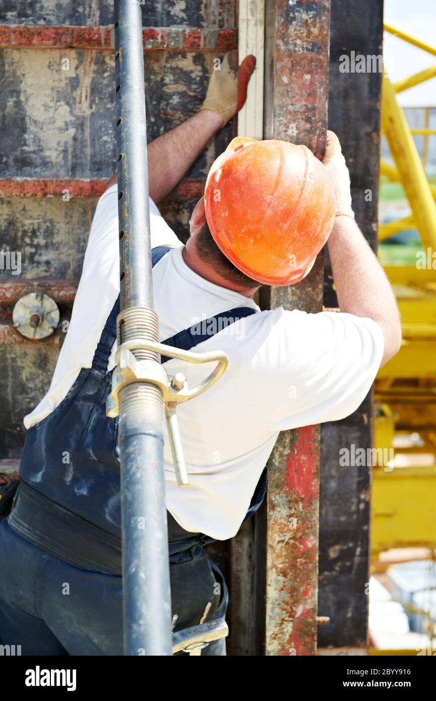builder at construction work Stock Photo
