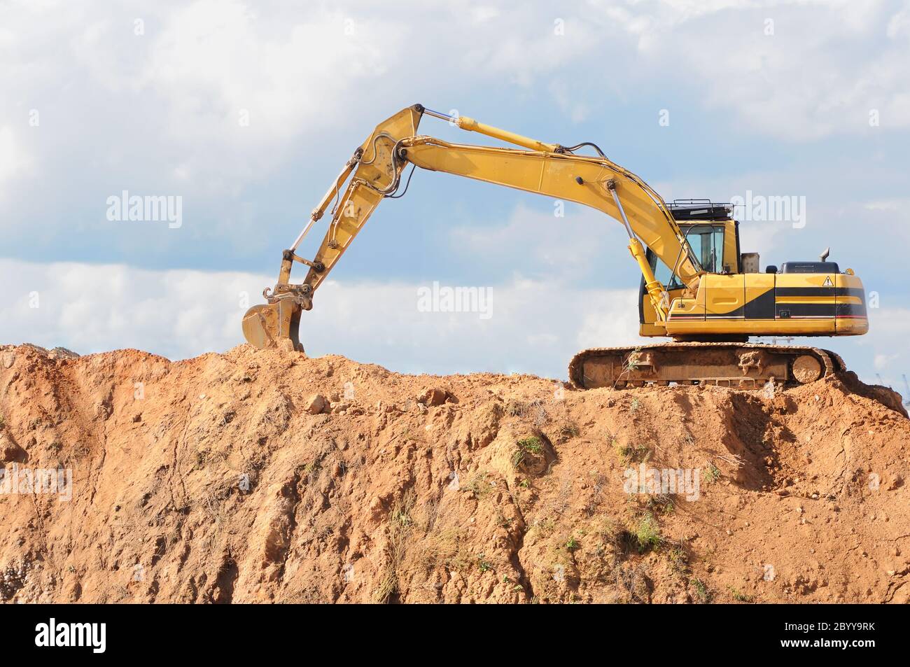 track-type loader excavator at construction area Stock Photo