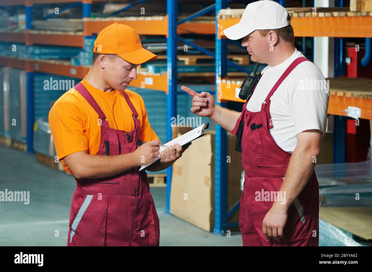 manual workers in warehouse Stock Photo