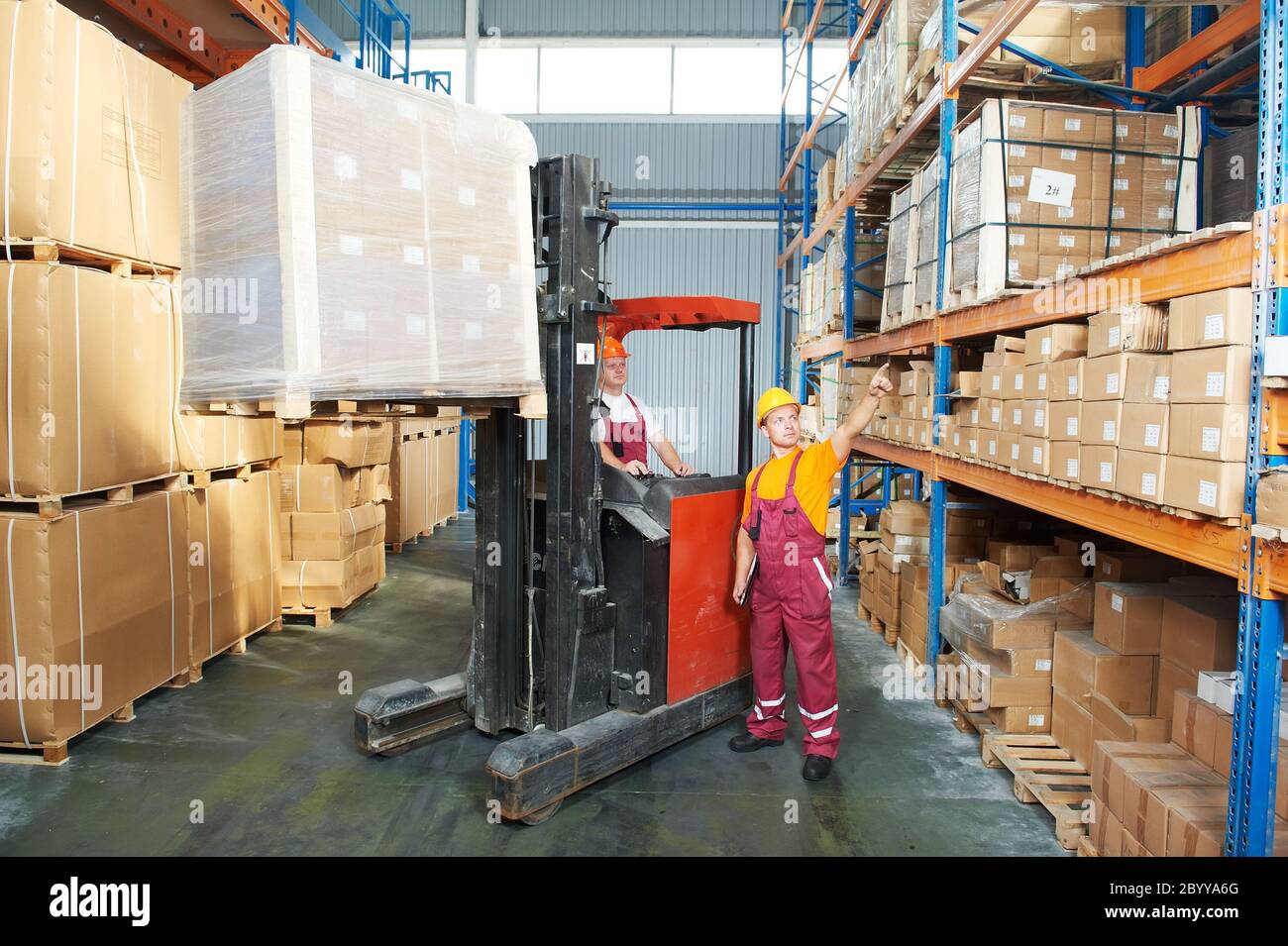 distribution in warehouse with forklift Stock Photo