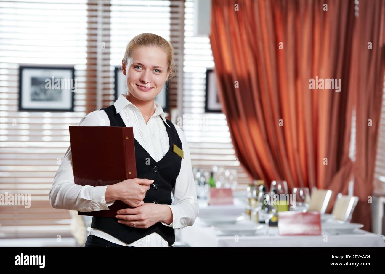 restaurant manager woman at work place Stock Photo